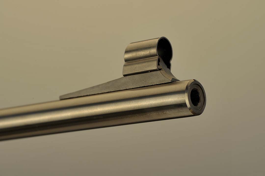 This hooded front sight is standard with a gold bead. Like the rear sight assembly, it is removable.